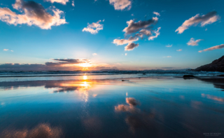 Reflections of clouds at sunset