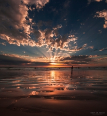 Sun rays at sunset on Strand Beach